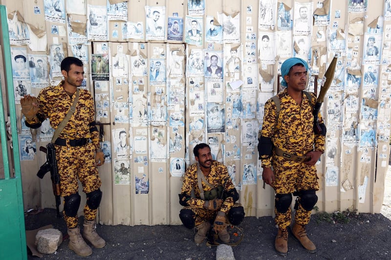 epa07243633 Members of Houthi militia wait to visit the graves of their comrades allegedly killed in ongoing fighting, at a cemetery in Sana'a, Yemen, 21 December 2018. According to reports, a committee of UN monitors, chaired by Retired Dutch General Patrick Cammaert, is expected to arrive in Yemen's embattled port province of Hodeidah within two days to observe the implementation of a UN-brokered ceasefire between Yemeni Saudi-backed government forces and the Houthi rebels and the withdrawal of rival forces from the province.  EPA/YAHYA ARHAB