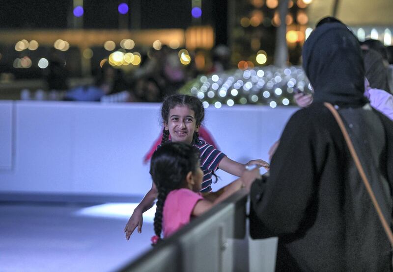 Abu Dhabi, United Arab Emirates - Young kids training themselves on the waxice ring at the Winter Wonderland event on the Galleria Mall promenade. Khushnum Bhandari for The National