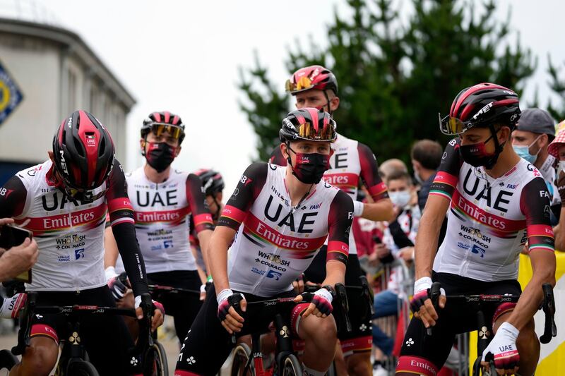 Slovenia's Tadej Pogacar, centre, and his UAE Team Emirates teammates  before the start of the first stage of the Tour de France in Landerneau, north-west France. AP Photo
