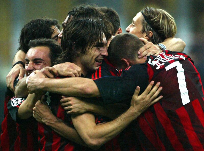 AC Milan players celebrate at the end of the Champions League semi-final second leg against Inter Milan at the San Siro on May 13, 2003. AC Milan reached the final on the away-goals rule following a 1-1 draw. Reuters