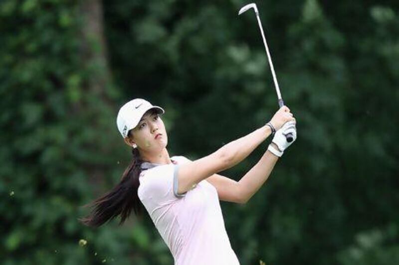 SPRINGFIELD, IL - JUNE 11: Michelle Wie hits her second shot on the eighth hole during the third round of the LPGA State Farm Classic at Panther Creek Country Club on June 11, 2011 in Springfield, Illinois. Christian Petersen/Getty Images/AFP