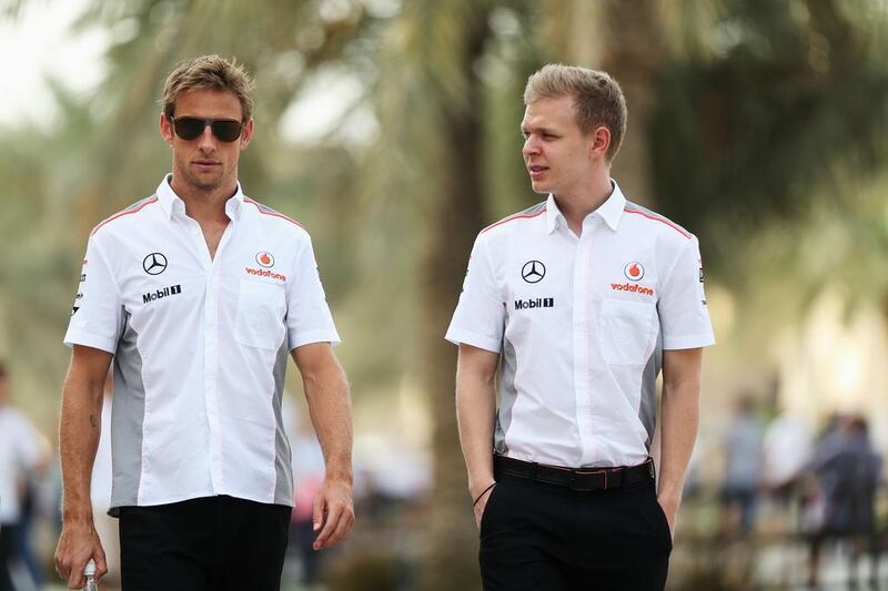 Kevin Magnussen, right, is unlikely to team up with Jenson Button in 2014 despite receiving high praise from McLaren's Martin Whitmarsh. Mark Thompson / Getty Images