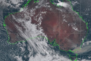 This handout satellite image taken and received on January 3, 2020 from the Japan Meteorological Agency shows an image from the Himawari-8 satellite of Australia, with smoke (bottom R) from bushfires visably drifting off the coast of southeast New South Wales state. At least 20 people have died, dozens are missing, more than 1,300 homes have been damaged in an unprecedented months-long bushfire crisis across Australia that has torched an area roughly double the size of Belgium or Hawaii. - -----EDITORS NOTE --- RESTRICTED TO EDITORIAL USE - MANDATORY CREDIT "AFP PHOTO / JAPAN METEOROLOGICAL AGENCY" - NO MARKETING - NO ADVERTISING CAMPAIGNS - DISTRIBUTED AS A SERVICE TO CLIENTS / AFP / Japan Meteorological Agency / Handout / -----EDITORS NOTE --- RESTRICTED TO EDITORIAL USE - MANDATORY CREDIT "AFP PHOTO / JAPAN METEOROLOGICAL AGENCY" - NO MARKETING - NO ADVERTISING CAMPAIGNS - DISTRIBUTED AS A SERVICE TO CLIENTS