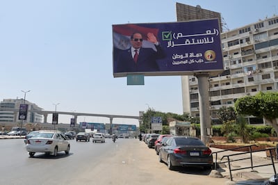 A billboard in Cairo supporting Egypt's President Abdel Fattah El Sisi reads "Yes to stability!". Reuters