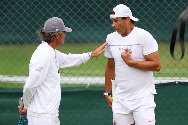 Rafael Nadal talks with coach Francisco Roig. Getty