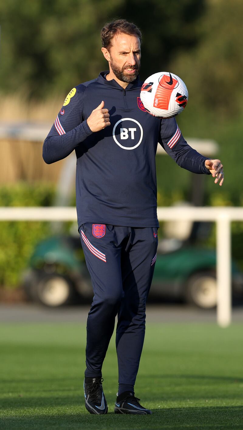 England manager Gareth Southgate watches the training session.