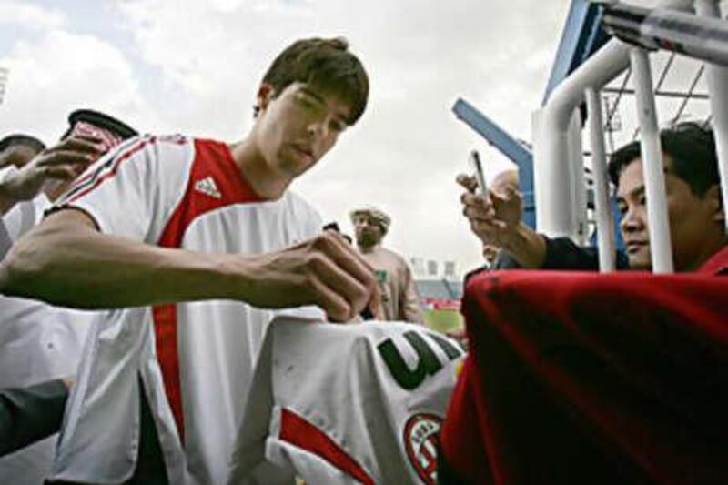 AC Milan's Kaka signs autographs after a training session in Dubai in January. The team will return for the Dubai Football Challenge.