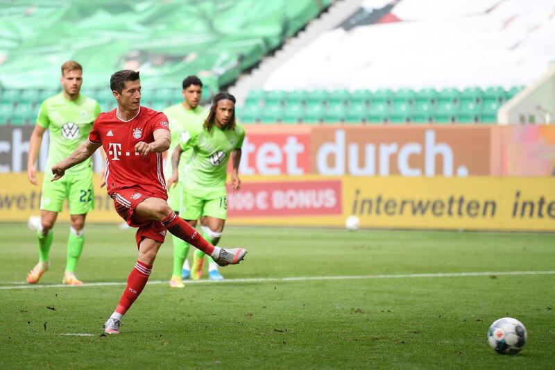 Robert Lewandowski scores Bayern's third goal from the penalty spot. EPA