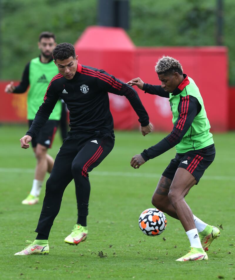 Cristiano Ronaldo and Marcus Rashford of Manchester United in action.