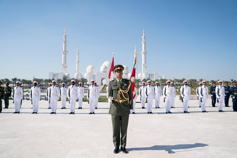 ABU DHABI, UNITED ARAB EMIRATES - November 30, 2017: Members of the UAE Armed Forces observe a moment of silence during a Commemoration Day flag raising ceremony at Wahat Al Karama, a memorial dedicated to the memory of UAE’s National Heroes in honour of their sacrifice and in recognition of their heroism.
( Hamad Al Kaabi / Crown Prince Court - Abu Dhabi )
---