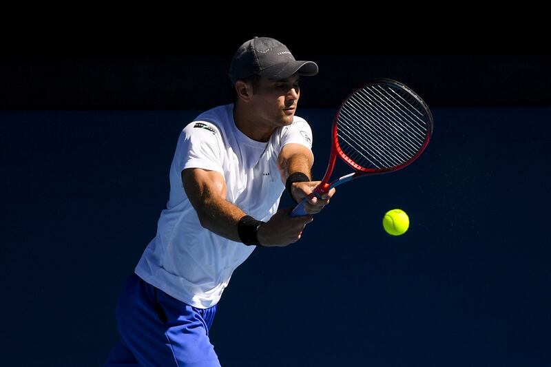 Marcos Giron of the United States returns to Rafael Nadal of Spain. EPA