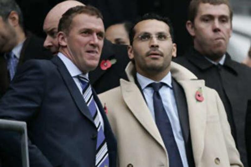 The Manchester City executive chairman Garry Cook, left, and the chairman Khaldoon al Mubarak look on during the team's loss to Tottenham Hotspur on Sunday.