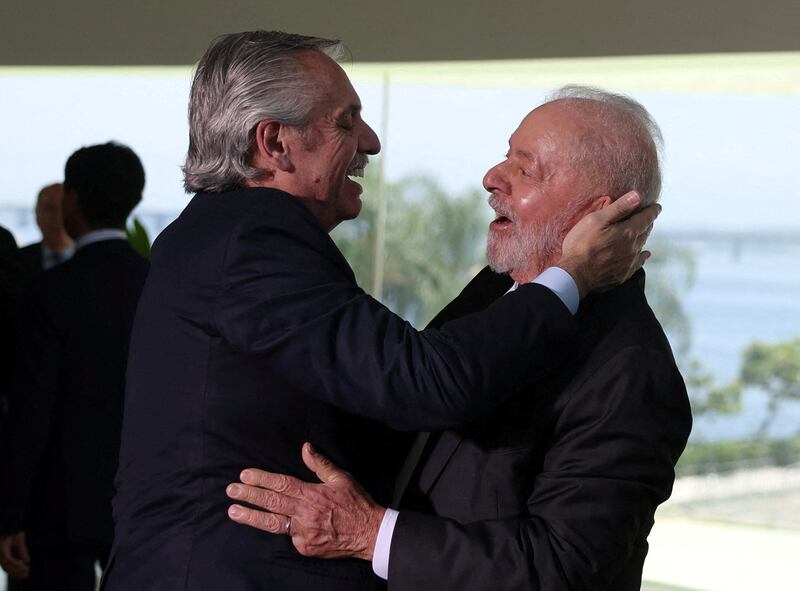 Argentina's president Alberto Fernandez greets Brazil's President Luiz Inacio Lula da Silva during a summit in Rio de Janeiro. Reuters