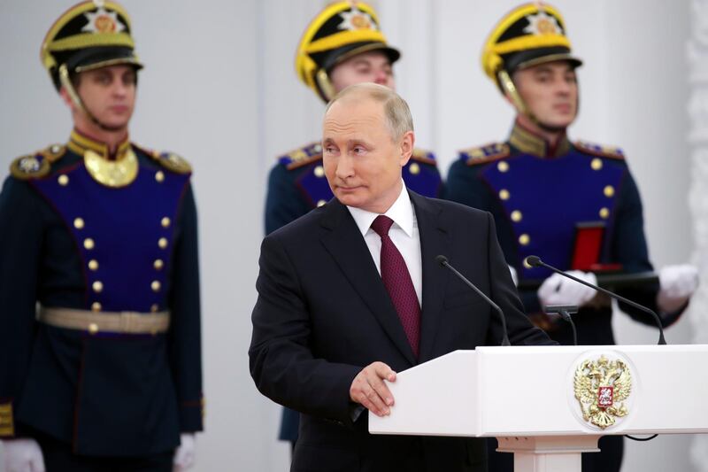 Russian President Vladimir Putin speaks while marking Day of Russia at the Grand Kremlin Palace in Moscow, Russia, Saturday, June 12, 2021. Since 1992, Russia Day is annually celebrated on 12 June as the Russian Federation's national holiday. (Mikhail Klimentyev, Sputnik, Kremlin Pool Photo via AP)