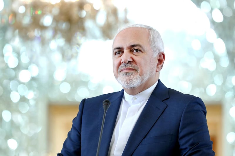 In this Monday, June 10, 2019 photo, Iranian Foreign Minister Mohammad Javad Zarif speaks during a press conference with his German counterpart Heiko Maas after their talks in Tehran, Iran. Zarif acknowledged Monday, July 1, 2019, Iran had broken the limit set on its stockpile of low-enriched uranium by the 2015 nuclear deal, marking its first major departure from the unraveling agreement a year after the U.S. unilaterally withdrew from the accord. (AP Photo/Ebrahim Noroozi)