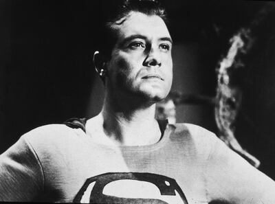 American actor George Reeves (1914 - 1959) holds his head high in a still from the television series, 'Adventures of Superman,' or from one of the films in which he played the superhero, 1950s. (Photo by Hulton Archive/Courtesy of Getty Images)