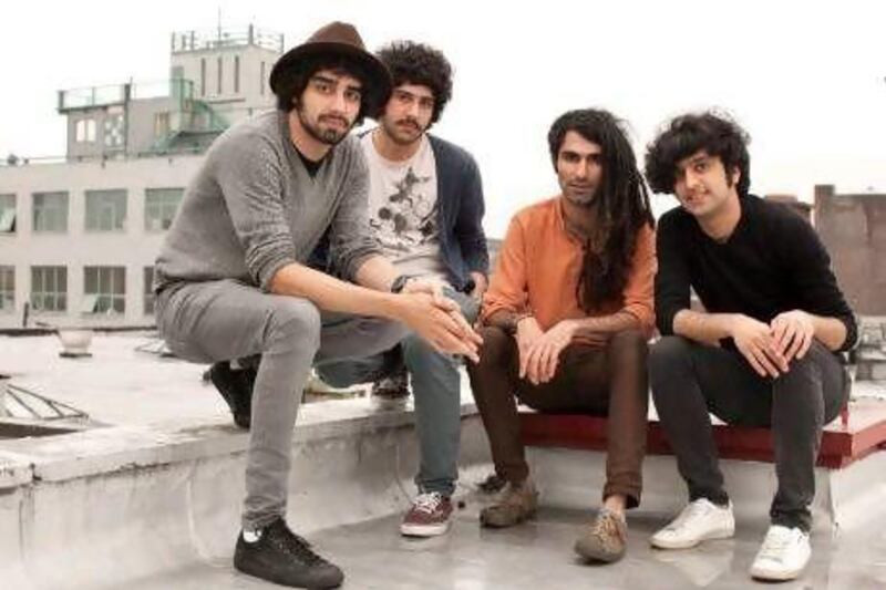 The Yellow Dog band members in their Brooklyn neighbourhood. From left, Arash, his brother Looloosh, Obaash and Koory. Dave Sanders for The National