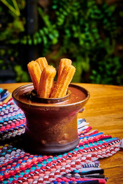 The churros with orange zest were a highlight of the meal. Photo: Coya Riyadh