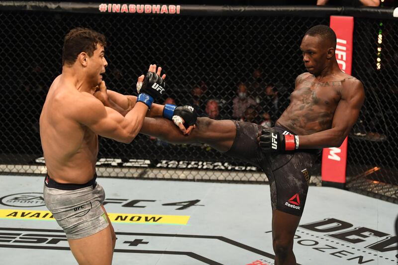 Israel Adesanya kicks Paulo Costa during their middleweight title bout at UFC 253 in Abu Dhabi. Josh Hedges / Zuffa LLC