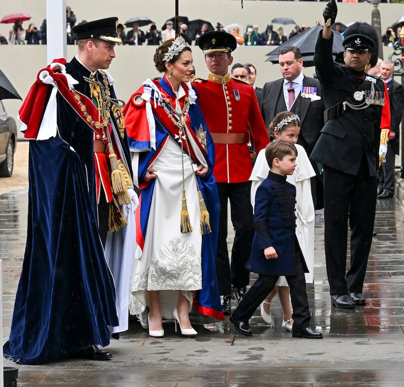 The Prince and Princess of Wales, with Princess Charlotte and Prince Louis, arrive for the coronation at Westminster Abbey. Photo: Andy Stenning / Pool via Reuters
