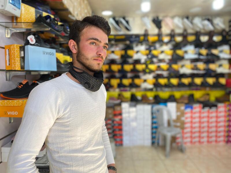 Fahd Deep, a Syrian shop owner at Raghadan market, expresses concern over Jordan’s upcoming Friday lockdowns. Amy McConaghy / The National