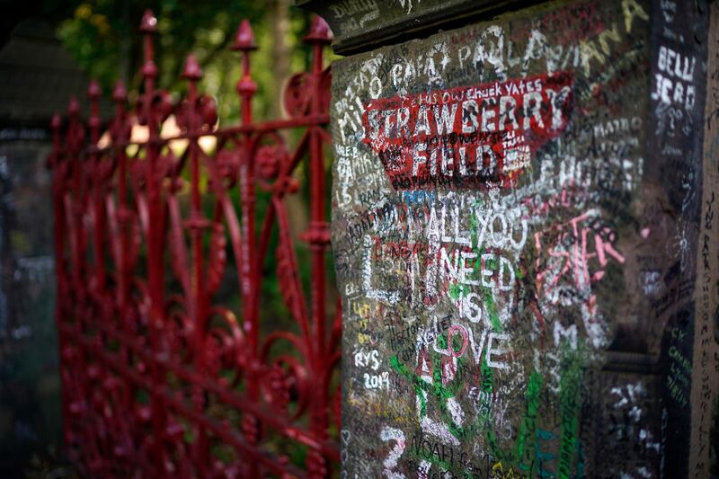 Graffiti covers the original entrance to Strawberry Field.