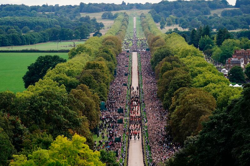 The ceremonial procession of the coffin of Queen Elizabeth travels down the Long Walk as it arrives at Windsor Castle for the Committal Service at St George's Chapel. AP