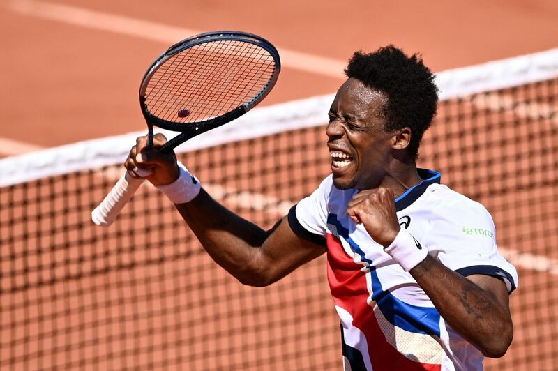 France's Gael Monfils celebrates after beating Albert Ramos-Vinolas of Spain in four sets. AFP