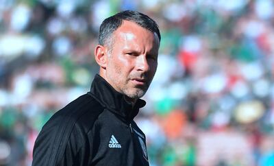 Wales coach and former Manchester United star Ryan Giggs walks off the pitch prior to kickoff against Mexico in an international football friendly at the Rose Bowl in Pasadena, California on May 28, 2018 where the game ended 0-0.  / AFP / Frederic J. BROWN
