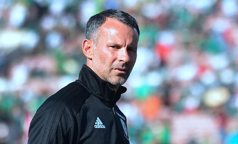 Wales coach and former Manchester United star Ryan Giggs walks off the pitch prior to kickoff against Mexico in an international football friendly at the Rose Bowl in Pasadena, California on May 28, 2018 where the game ended 0-0.  / AFP / Frederic J. BROWN
