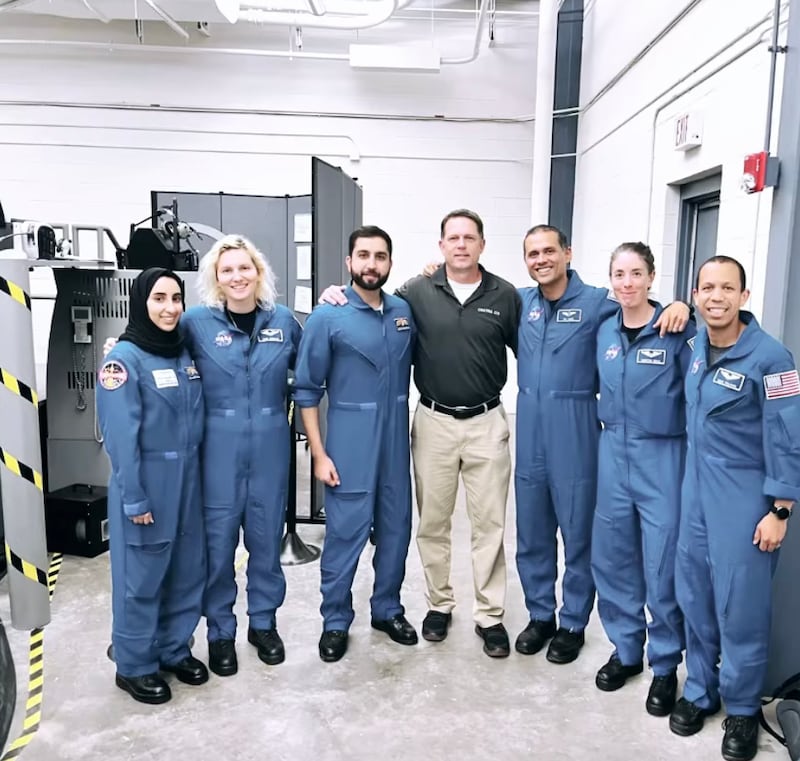 Ms Al Matrooshi (left) and Mr Al Mulla (second to left) at a simulation flying ground school with their Nasa colleagues. Photo: Anil Menon Instagram