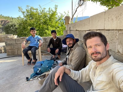 Leon McCarron, right and Lawin Mohammad, second right, founders of the Zagros Mountain Trail. Photo: Leon McCarron