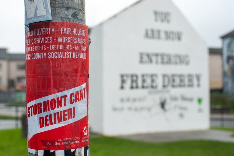 A sticker on a post near the Free Derry Wall, in Lononderry. The city was focus of police searches this week that uncovered an old weapon linked to a New IRA bomb plot. Bloomberg