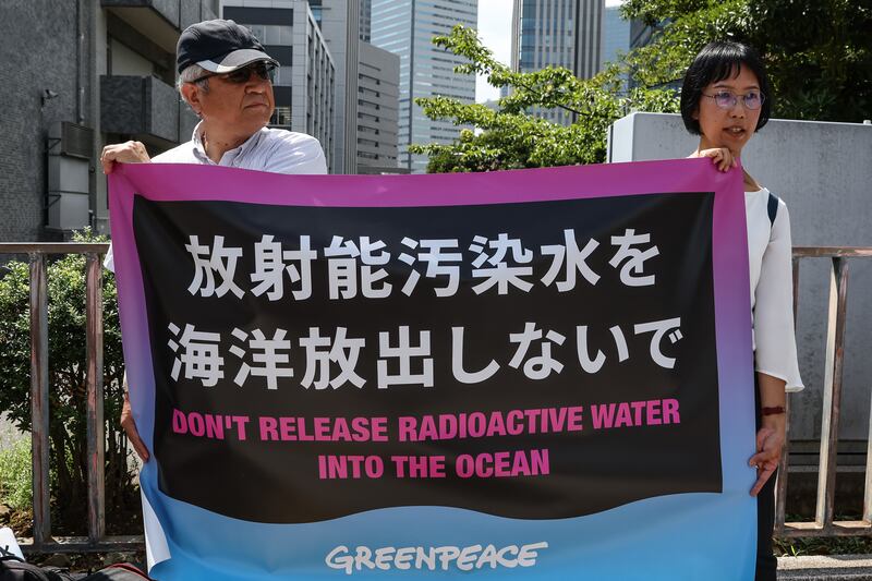 The move has drawn criticism, such as from these protesters outside the Japanese prime minister's official residence. Getty Images
