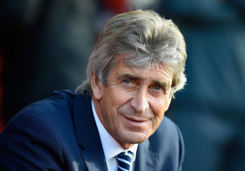 Manchester City manager Manuel Pellegrini looks on during the English Premier League match against Southampton at St Mary's Stadium on November 30, 2014, in Southampton, England.  Mike Hewitt / Getty Images