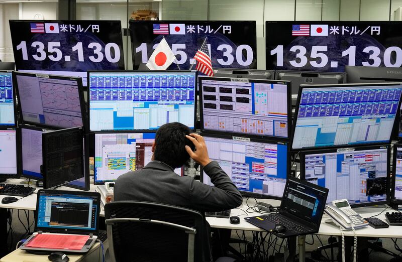 A trader at work in Tokyo, Japan. EPA