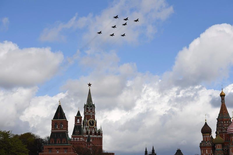 Russian MiG-29SMT jet fighters, forming the symbol Z in support of Russian military action in Ukraine, fly over Red Square in Moscow during a rehearsal for the Second World War Victory Parade on May 9, 2022. AFP