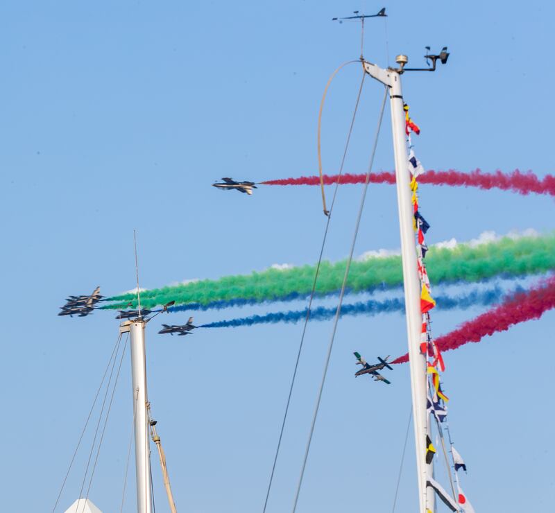 The UAE's Al Fursan aerobatics team provide soaring entertainment before the qualifying session at the Abu Dhabi Grand Prix. Victor Besa / The National