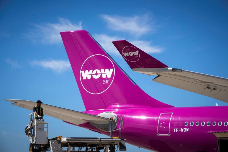 A picture taken on August 6, 2018 shows a Wow plane on the tarmac of Roissy-Charles de Gaulle Airport, north of Paris. (Photo by JOEL SAGET / AFP)