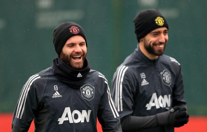 Manchester United's Juan Mata, left, and Bruno Fernandes during training on Wednesday ahead of their Europa League match at Club Brugge. AP