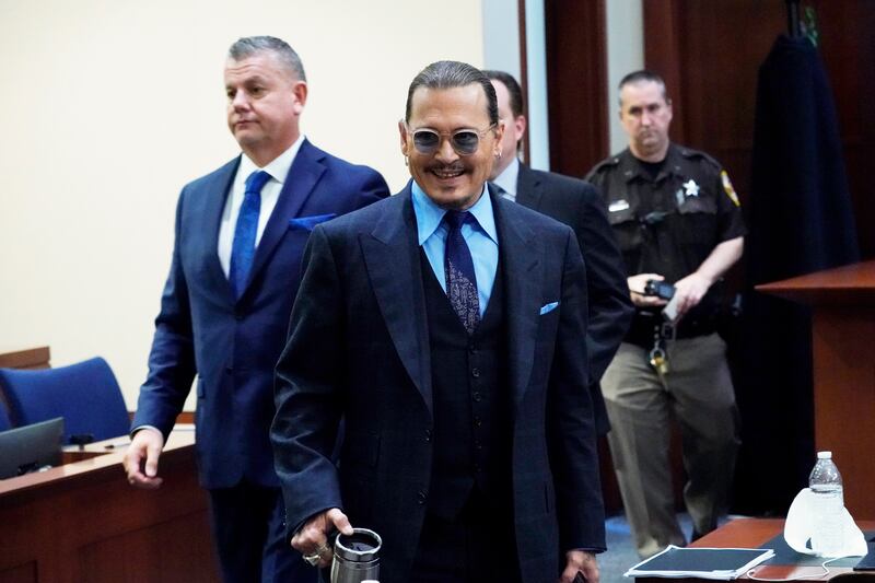 Actor Johnny Depp walks into the courtroom after a break. AP