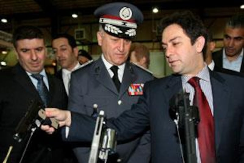 The interior minister, Ziad Baroud, right, and Gen Ashraf Rifi, centre, the police force's chief of staff, disagreed over the dismissal of a police official.