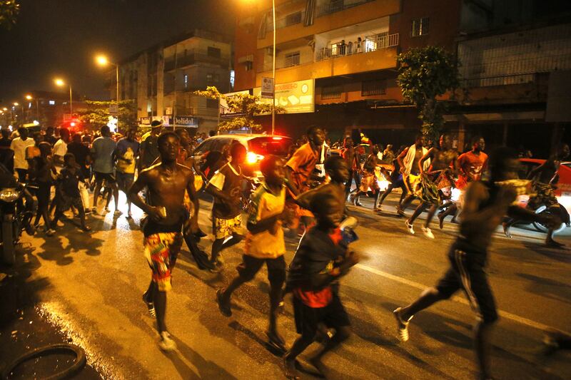 Supporters of Senegal's national football team celebrate in the streets of Abidjan, Ivory Coast. EPA