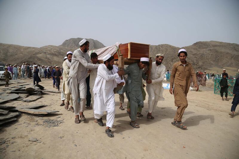 epa06814978 People attend the funeral of the victims who were killed a day earlier in a suicide bomb attack in Rodat district, Afghanistan, 17 June 2018. At least 36 people including Taliban militants have been killed and 65 others injured in an alleged suicide attack in eastern Afghanistan that struck a group of civilians and Taliban militants who were celebrating a ceasefire. Earlier in the month, President Ghani's government had announced a temporary ceasefire, starting on Jun. 12, to last until the end of the festival. The Taliban had followed suit a few days later and announced a three-day partial ceasefire during the festival.  EPA/GHULAMULLAH HABIBI