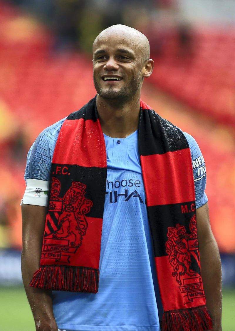LONDON, ENGLAND - MAY 18:  Vincent Kompany of Manchester City celebrates victory after the FA Cup Final match between Manchester City and Watford at Wembley Stadium on May 18, 2019 in London, England. (Photo by Tom Flathers/Man City via Getty Images)