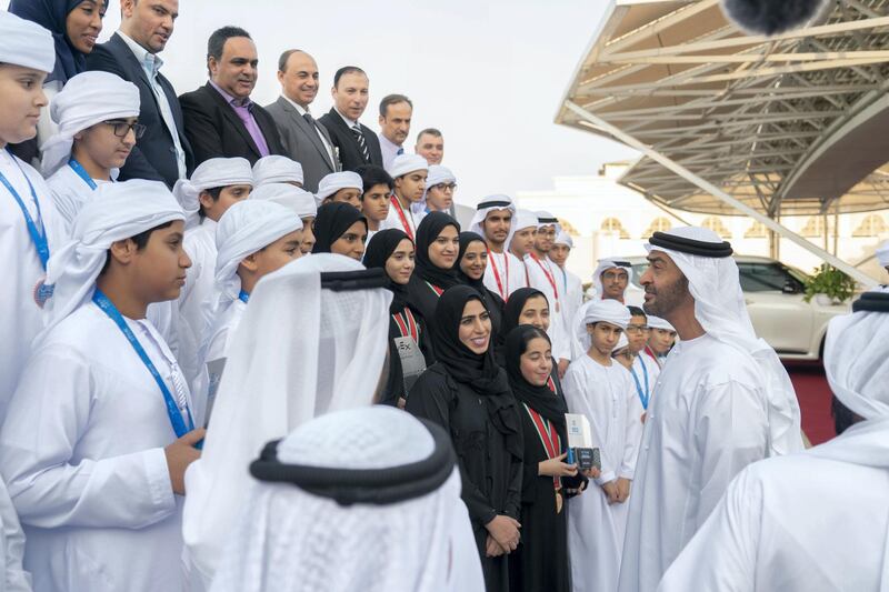 ABU DHABI, UNITED ARAB EMIRATES - June 24, 2019: HH Sheikh Mohamed bin Zayed Al Nahyan Crown Prince of Abu Dhabi Deputy Supreme Commander of the UAE Armed Forces (R), receives The UAE School students who won the second place in the World Championship of Artificial Intelligence and Robot Fix, which was held in Kentucky, USA, during a Sea Palace barza. 

( Rashed Al Mansoori / Ministry of Presidential Affairs )
---