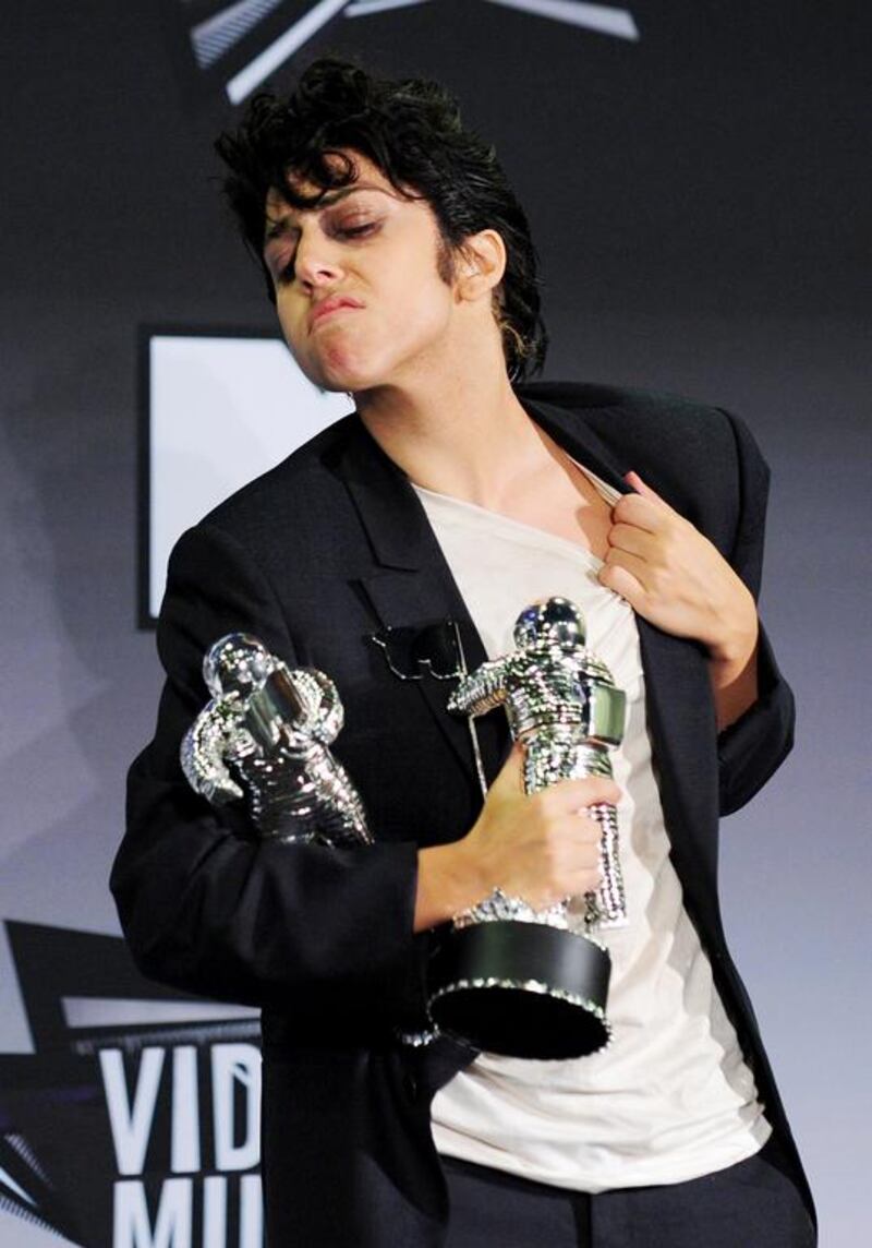 Lady Gaga holds her Best Female Video Award and Best Video With A Message Award in the press room at the 2011 MTV Video Music Awards (VMAs) on August 28, 2011 at the Noika Theatre in downtown Los Angeles, California. Frederic J. Brown / AFP photo