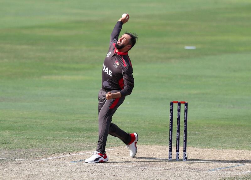 Dubai, United Arab Emirates - October 30, 2019: Rohan Mustafa of the UAE bowls during the game between the UAE and Scotland in the World Cup Qualifier in the Dubai International Cricket Stadium. Wednesday the 30th of October 2019. Sports City, Dubai. Chris Whiteoak / The National