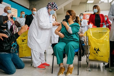 Receiving the vaccine "means a lot to me," said Meherzia Hammami, who has treated ‚Äî and lost ‚Äî loved ones along with hundreds of other patients over the course of the year. Erin Clare Brown/ The National