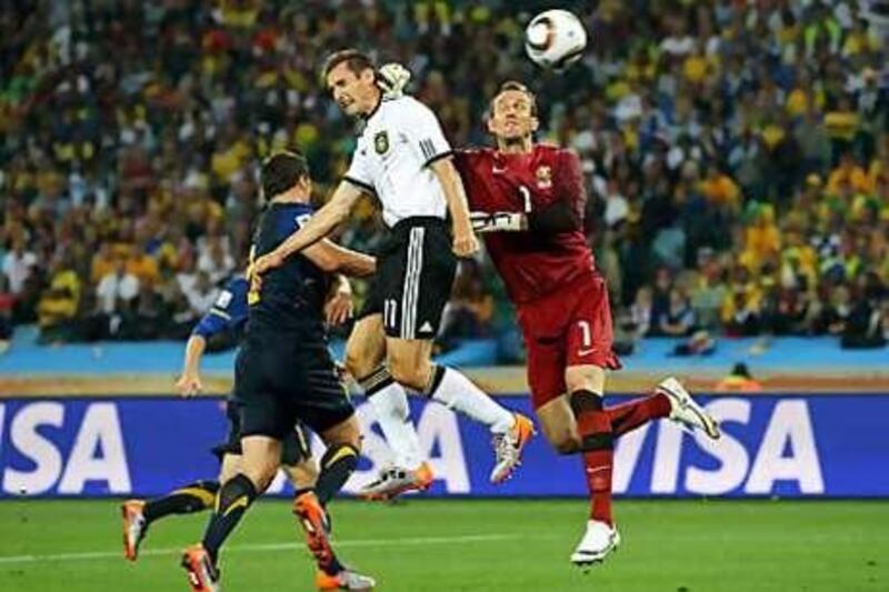 Miroslav Klose rises to head home Germany's second goal against Australia at Moses Mabidha Stadium last night.